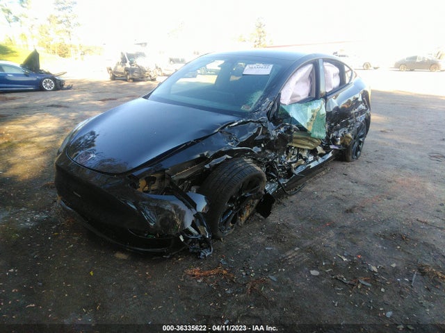 Tesla Model Y Long Range 2023 7SAYGAEE1PF696777 Image 2