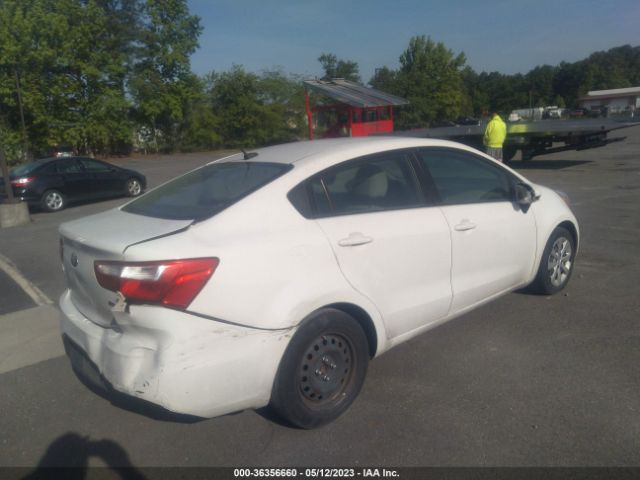 KNADM4A3XE6390998 KIA RIO LX