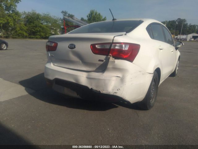 KNADM4A3XE6390998 KIA RIO LX