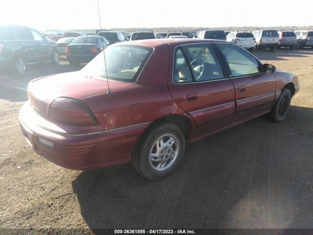 1995 PONTIAC GRAND AM SE VIN: 1G2NE55D7SC799460