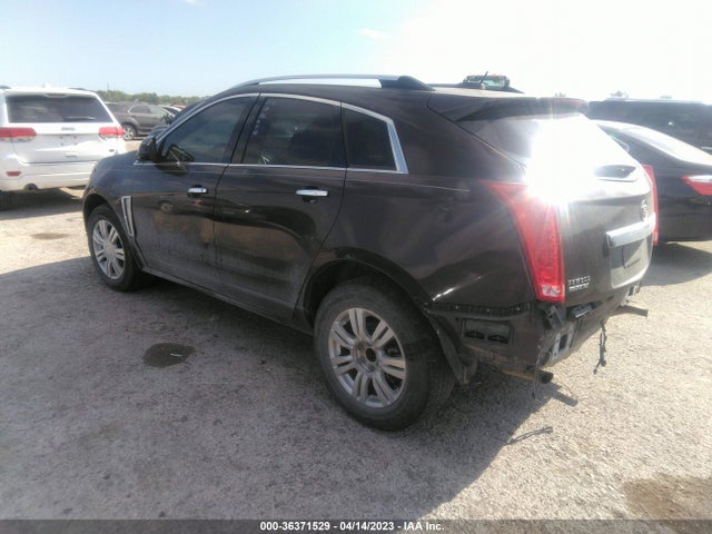 2015 Cadillac SRX, VIN: 3GYFNBE39FS547029
