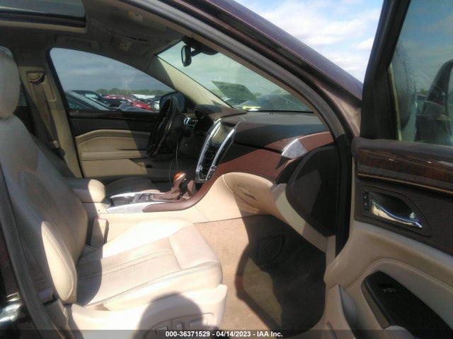 2015 Cadillac SRX, VIN: 3GYFNBE39FS547029