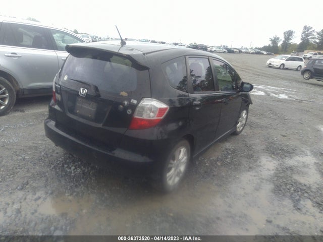 2010 HONDA FIT SPORT VIN: JHMGE8H61AS021984