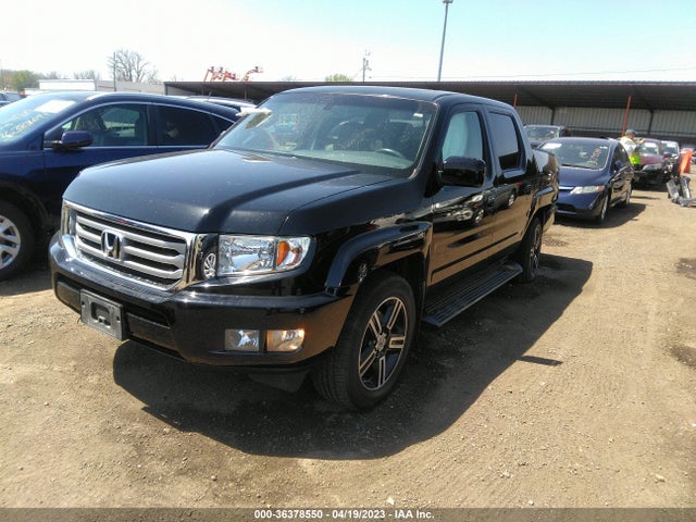 2012 HONDA RIDGELINE RTL VIN: 5FPYK1F55CB457633