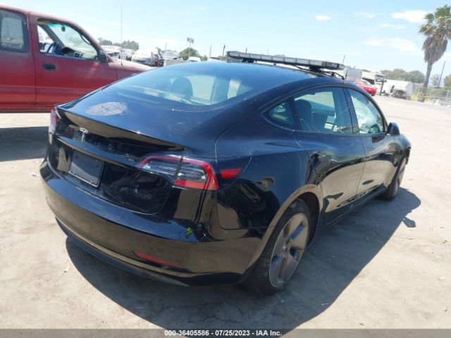 5YJ3E1EA2MF985608 Tesla Model 3 Standard Range Plus