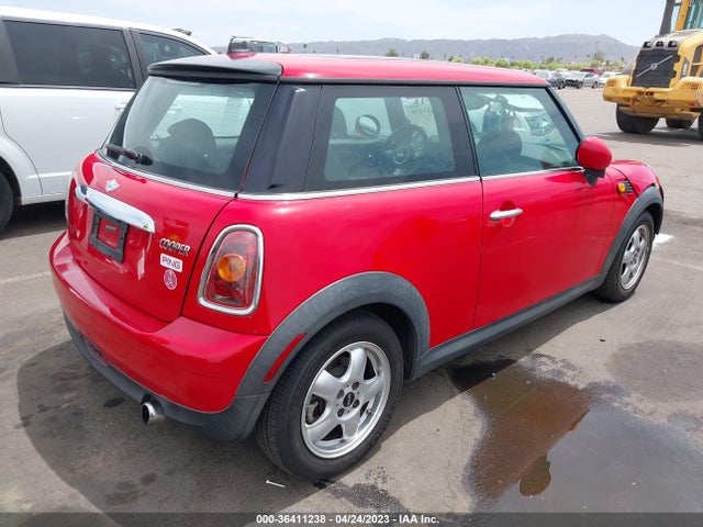 2010 MINI COOPER HARDTOP VIN: WMWMF3C55ATZ24133