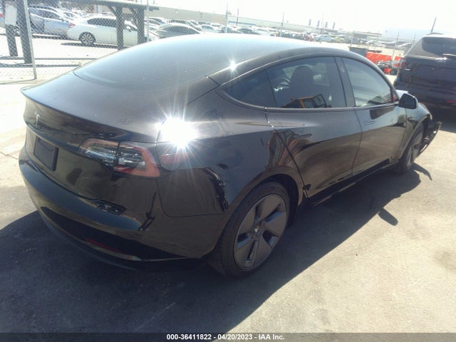 Tesla Model 3 Standard Range Plus 2021 5YJ3E1EAXMF026859 Image 4