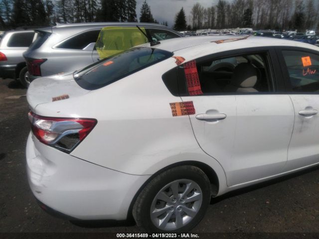 KNADM4A39E6374632 KIA RIO LX