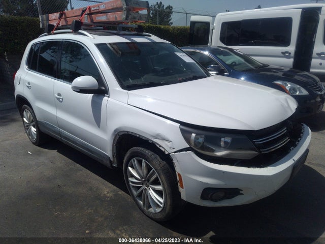 2013 VOLKSWAGEN TIGUAN SE W/SUNROOF & NAV VIN: WVGAV7AX3DW558675