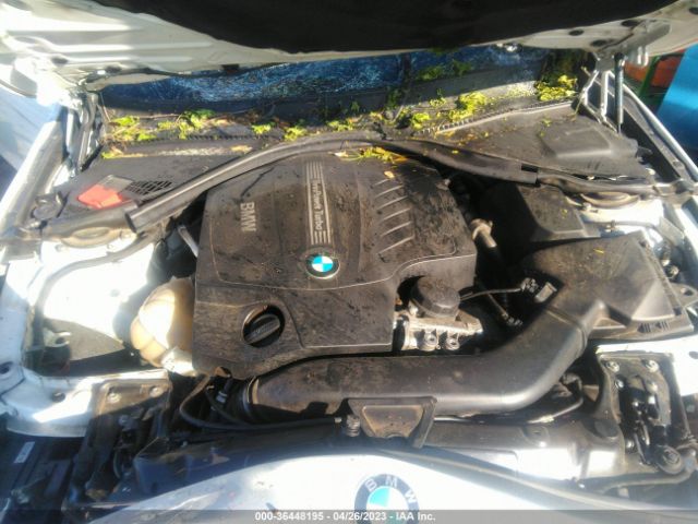 WBA3A9C5XEF479437 BMW 3 Series 335i