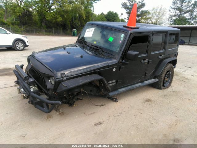 1C4BJWDG7EL288136 Jeep Wrangler Unlimited Sport