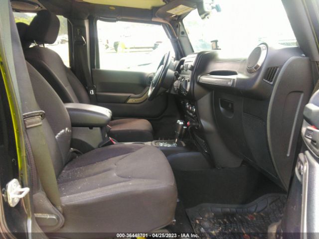 1C4BJWDG7EL288136 Jeep Wrangler Unlimited Sport