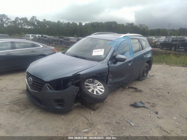 2016 MAZDA CX-5 SPORT VIN: JM3KE2BY2G0671387