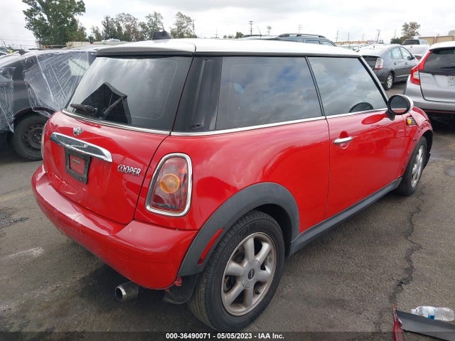 2010 MINI COOPER HARDTOP VIN: WMWMF3C55ATZ66138