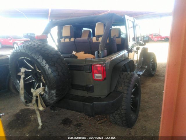 1C4BJWDGXFL771668 Jeep Wrangler Unlimited Sport