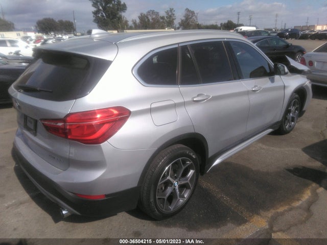 2019 BMW X1, VIN: WBXHU7C56K5L10086