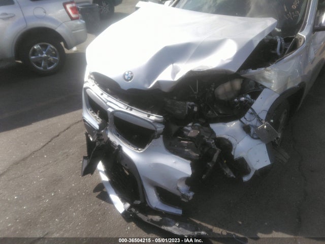 2019 BMW X1, VIN: WBXHU7C56K5L10086