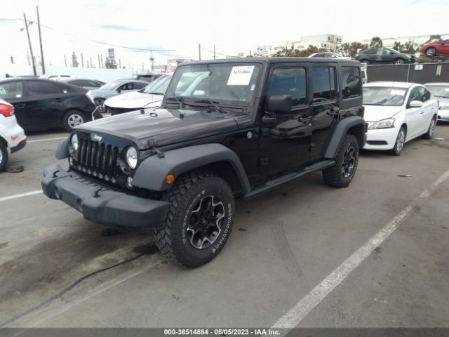 1C4BJWDG8EL281406 Jeep Wrangler Unlimited Sport