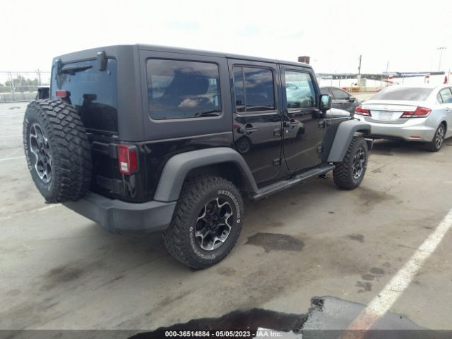 1C4BJWDG8EL281406 Jeep Wrangler Unlimited Sport