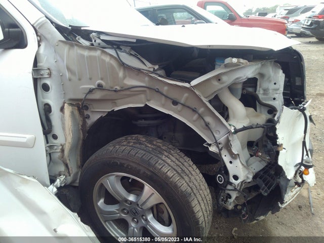 2014 HONDA PILOT EX-L VIN: 5FNYF3H57EB011637