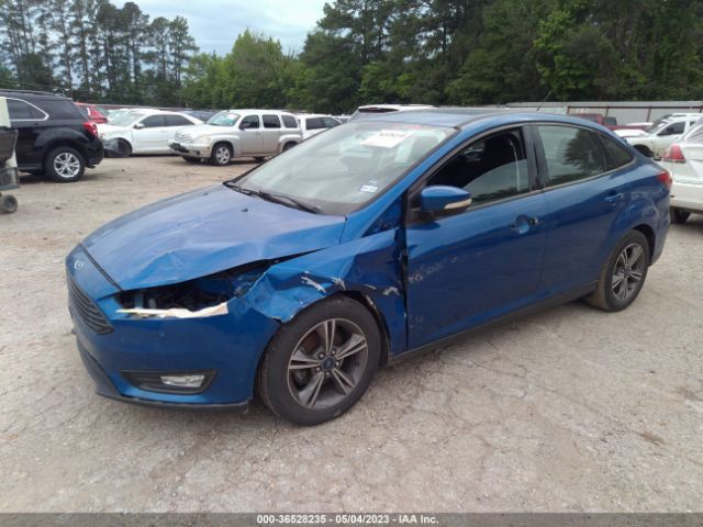 1FADP3F23JL290957 Ford FOCUS SE