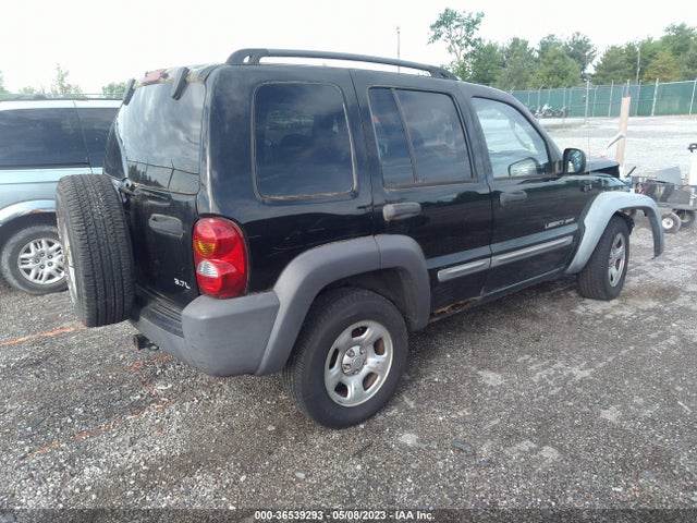 2003 JEEP LIBERTY SPORT VIN: 1J4GL48K63W579493