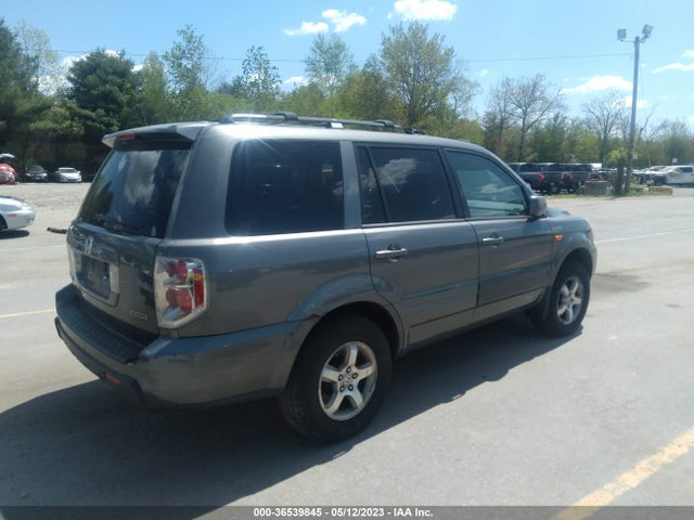 2007 HONDA PILOT EX-L VIN: 2HKYF18707H502447