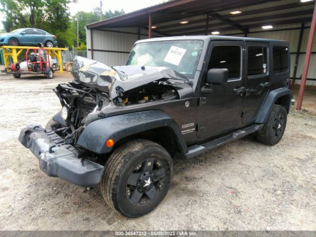1C4BJWDG5GL306443 Jeep Wrangler Unlimited Sport
