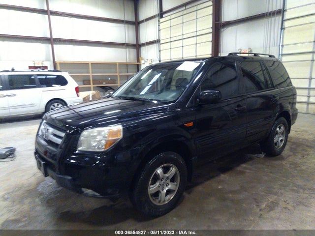2007 HONDA PILOT EX-L VIN: 5FNYF28697B008261