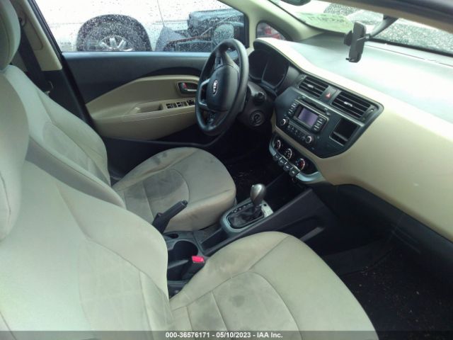 KNADM4A3XE6323236 KIA RIO LX