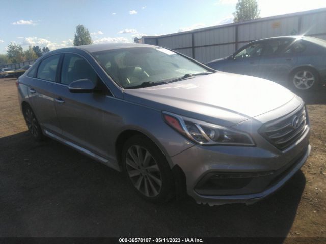 2015 5NPE34AF0FH128340 main image