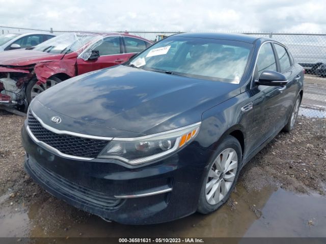 5XXGT4L36GG003884 KIA Optima Lx