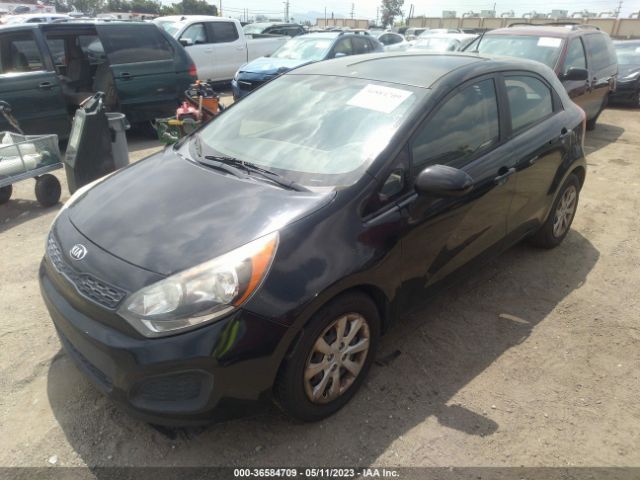 KNADM5A3XF6459129 KIA RIO LX