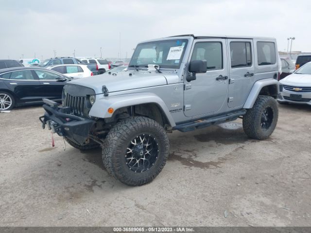 1C4BJWEG3EL138717 Jeep Wrangler Unlimited Sahara