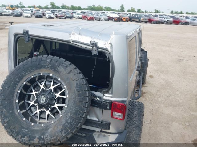 1C4BJWEG3EL138717 Jeep Wrangler Unlimited Sahara