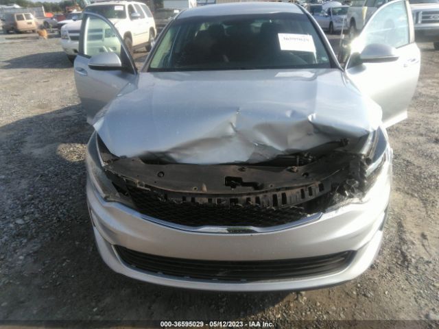5XXGT4L3XGG001877 KIA Optima Lx