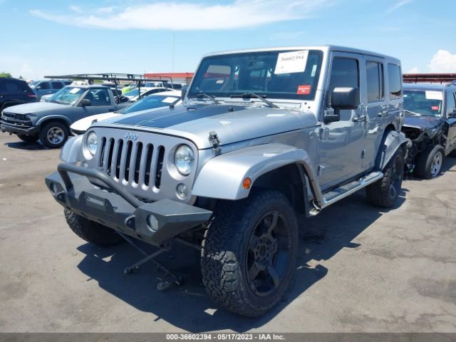 1C4BJWEG9EL129052 Jeep Wrangler Unlimited Sahara