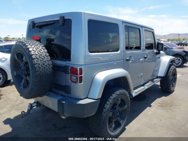 1C4BJWEG9EL129052 Jeep Wrangler Unlimited Sahara