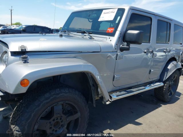 1C4BJWEG9EL129052 Jeep Wrangler Unlimited Sahara