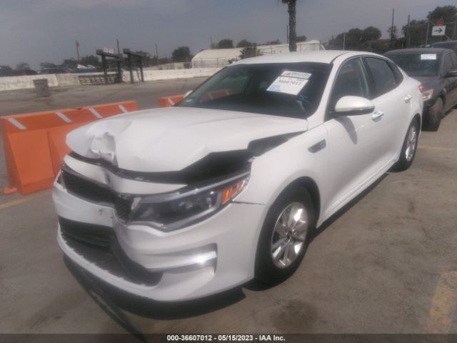 5XXGT4L34JG215111 KIA Optima Lx