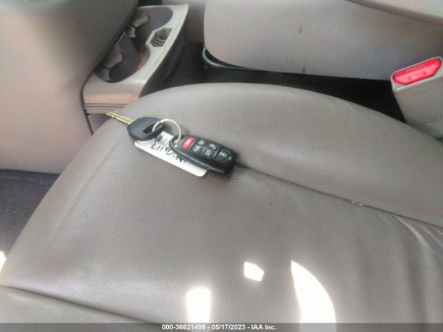 KNDMH4C78E6565563 KIA SEDONA EX