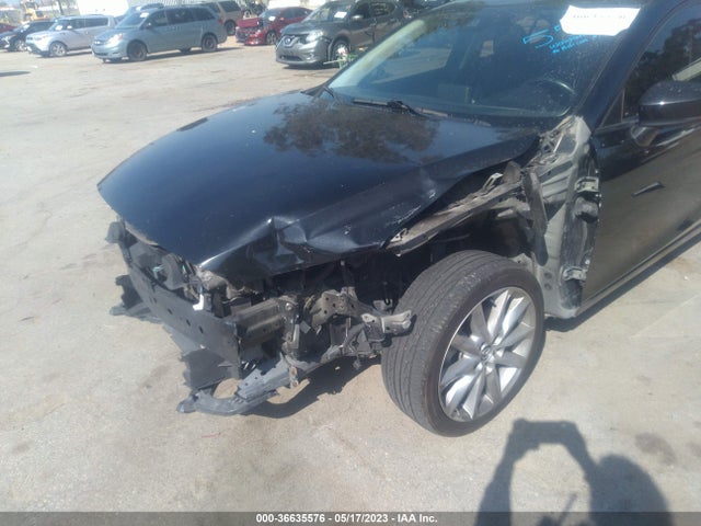 2017 MAZDA MAZDA3 4-DOOR TOURING VIN: JM1BN1V76H1107114