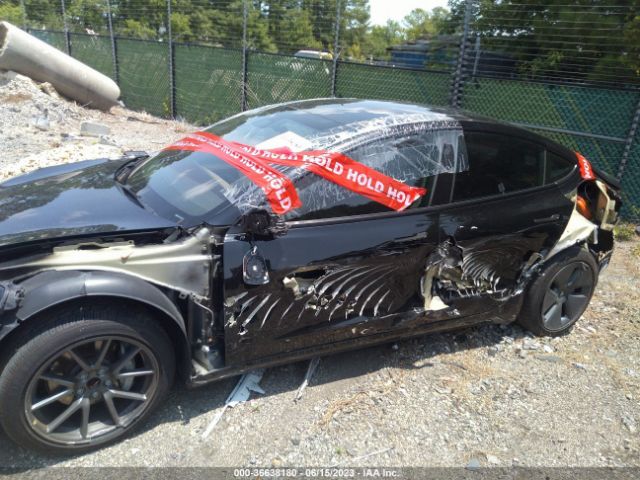 5YJ3E1EA4MF092775 Tesla Model 3 Standard Range Plus