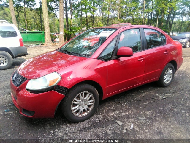 2012 SUZUKI SX4 LE POPULAR VIN: JS2YC5A38C6303941