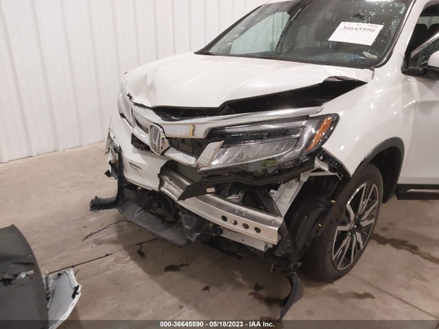 Honda Pilot Touring 7-passenger 2022 5FNYF6H64NB063849 Image 7
