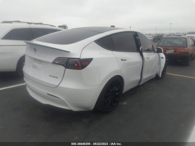 7SAYGDEF9NF328063 Tesla Model Y Performance