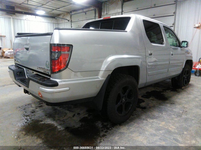 2012 HONDA RIDGELINE RTL VIN: 5FPYK1F52CB454396