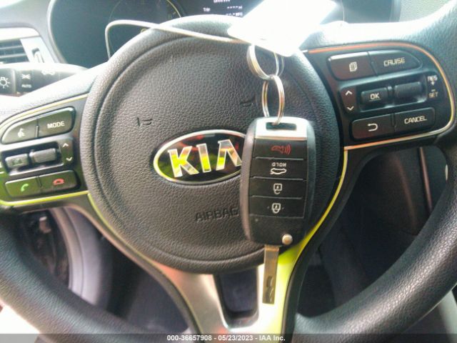 5XXGT4L35GG001074 KIA Optima Lx