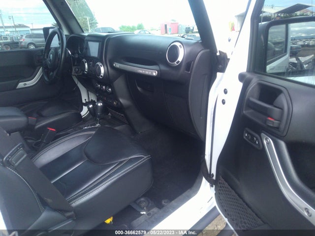 1C4BJWEG9FL566499 Jeep Wrangler Unlimited Sahara