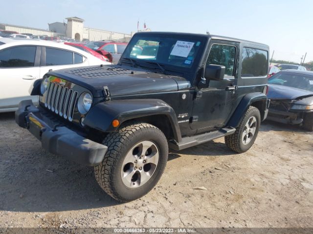 1C4GJWBG8GL220343 Jeep Wrangler Sahara